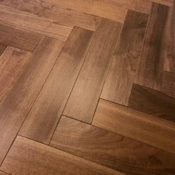 Liberty Floors American Black Walnut - Herringbone Parquet 14mm Engineered Real Wood Flooring (219505) -Real Wood Flooring Store american black walnut herringbone parquet 14mm engineered real wood flooring 219505 p85876 196395 image
