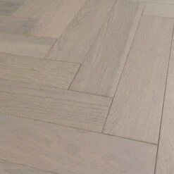 Liberty Floors Pebble Grey Oak - Herringbone Parquet 14mm Engineered Real Wood Flooring (219386) -Real Wood Flooring Store pebble grey oak herringbone parquet 14mm engineered real wood flooring 219386 p85834 201394 image