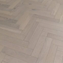 Liberty Floors Pebble Grey Oak - Herringbone Parquet 14mm Engineered Real Wood Flooring (219386) -Real Wood Flooring Store pebble grey oak herringbone parquet 14mm engineered real wood flooring 219386 p85834 201395 image